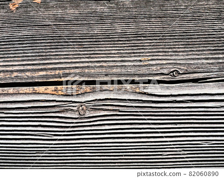 Wood texture background. Old gray wood texture for adding text or working design for a background product. side view in natural light. Small cracks and knots 82060890