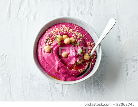 bowl of beetroot hummus bowl of beetroot hummus 82062743