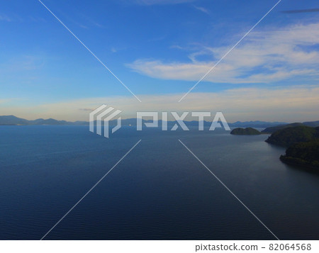 "Lake Inawashiro" at dusk-Aerial view with a drone (Akai character mansion, Minatomachi, Aizuwakamatsu City, Fukushima Prefecture) 82064568