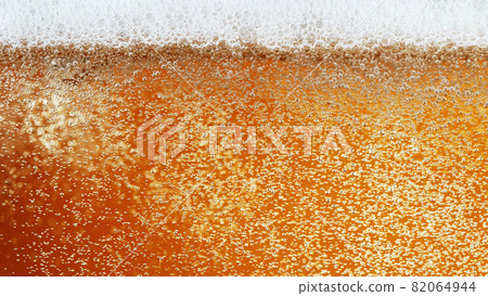Close up of beer bubbles, abstract texture. Close up of beer bubbles, abstract texture. 82064944