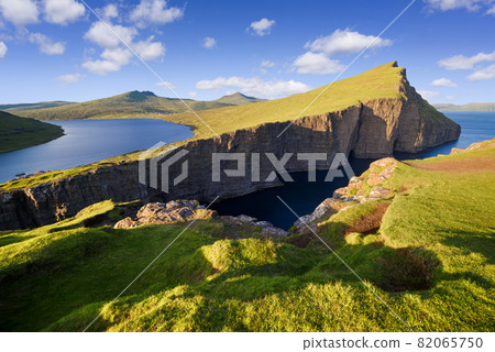 Leitisvatn or Sorvagsvatn - lake above the ocean on Vagar Island, Faroe Islands Leitisvatn or Sorvagsvatn - lake above the ocean on Vagar Island, Faroe Islands 82065750