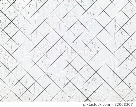 Rain water droplets on window glass photo material Rain water droplets on window glass photo material 82068307