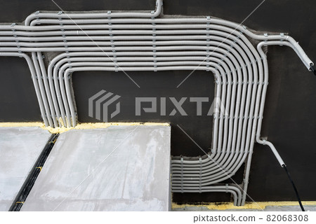 Electrical cables on concrete ceiling. Wiring during house renovation. Electrical cables on concrete ceiling. Wiring during house renovation. 82068308