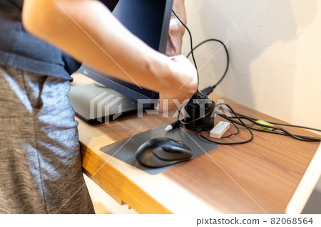 Wiring work for a computer monitor 82068564