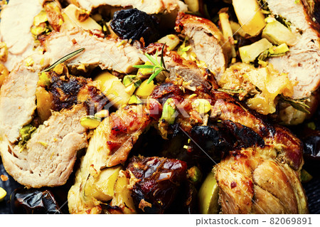 Meat roll with dates and apples,food background Meat roll with dates and apples,food background 82069891
