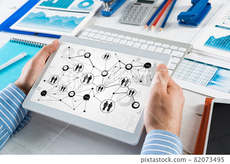 Men's hands hold a computer tablet 82073495