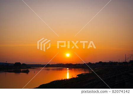 Sunset at chao phraya river ,Nakhon sawan Thailand , calm and mindfulness concept Sunset at chao phraya river ,Nakhon sawan Thailand , calm and mindfulness concept 82074142