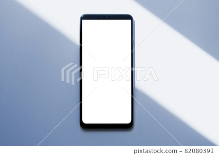Mobile phone mockup with sunlight and shadows Mobile phone mockup with sunlight and shadows 82080391