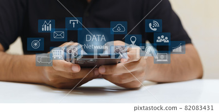 Man using smartphone with data network digital connect. 82083431