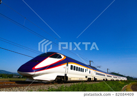Yamagata Shinkansen running under the blue sky Yamagata Shinkansen running under the blue sky 82084409