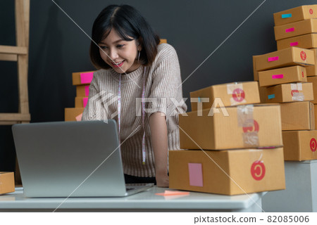 Young asian girl is freelancer with her private business at home office Young asian girl is freelancer with her private business at home office 82085006