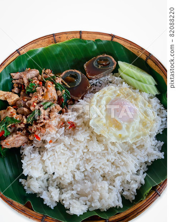 Rice topped with stir-fried pork or beef and basil Rice topped with stir-fried pork or beef and basil 82088220