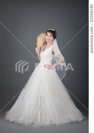 portrait of beautiful bride wearing white wedding dress portrait of beautiful bride wearing white wedding dress 82089240