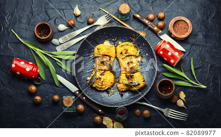 Baked pumpkin with spice herbs Baked pumpkin with spice herbs 82089977