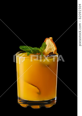 Hot pear and orange winter drink with mint 82091504