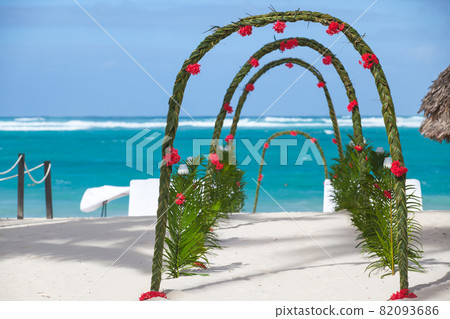 Arches with wedding decoration on the beach Arches with wedding decoration on the beach 82093686