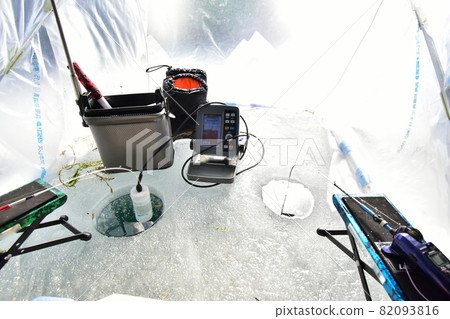 Smelt fishing on ice in the snail tent 82093816