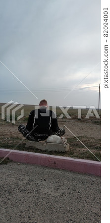 Motorbike driver enjoys nature view Motorbike driver enjoys nature view 82094001