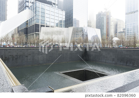 The 9/11 Memorial Pool in a gloomy day in New York City,NY The 9/11 Memorial Pool in a gloomy day in New York City,NY 82096360