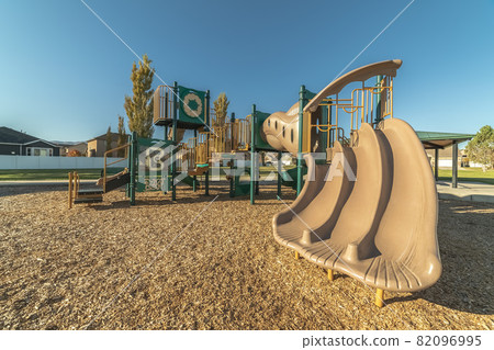 Unusual triple slide in a kids playground Unusual triple slide in a kids playground 82096995