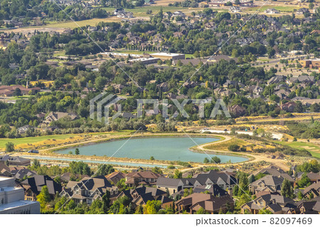 Haert shaped lake amid buildings and houses in Salt Lake City Utah suburbs Haert shaped lake amid buildings and houses in Salt Lake City Utah suburbs 82097469
