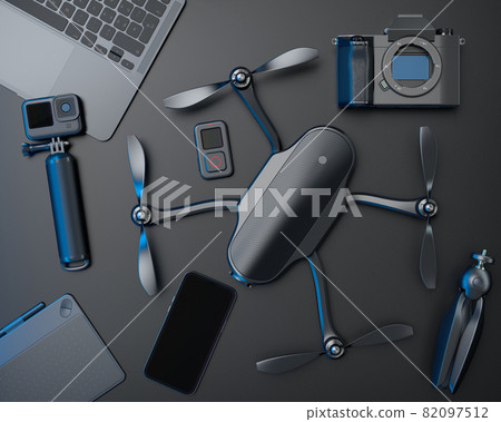 Top view of designer workspace and photography gear on black table background 82097512