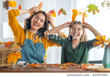 family doing autumn decor family doing autumn decor 82097840