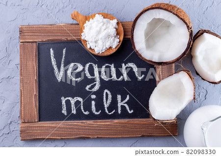 Chalk board and vegan powdered coconut milk, horizontal 82098330
