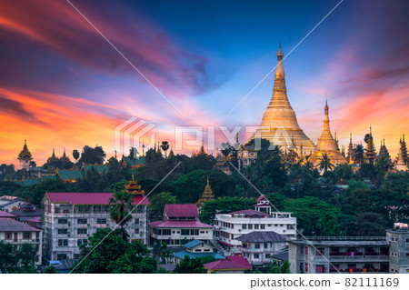 Shwedagon Pagoda attraction in Yagon City with blue sky background, Shwedagon Pagoda ancient architecture is beautiful pagoda in Southeast Asia, Yangon, Myanmar, Asian, Asia. Shwedagon Pagoda attraction in Yagon City with blue sky background, Shwedagon Pagoda ancient architecture is beautiful pagoda in Southeast Asia, Yangon, Myanmar, Asian, Asia. 82111169