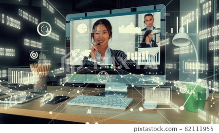 Creative visual of business people in a corporate staff meeting on video call 82111955