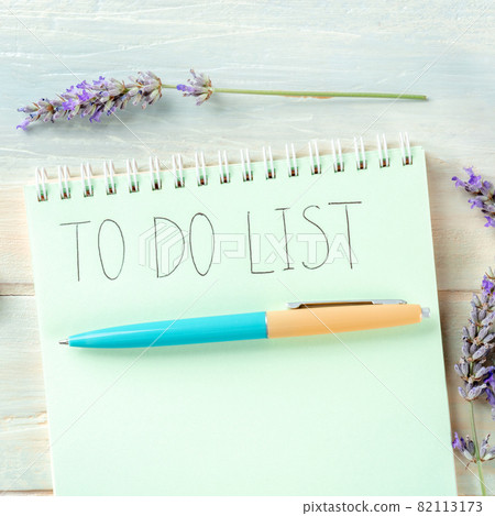 To do list square shot with lavender and a turquoise blue pen To do list square shot with lavender and a turquoise blue pen 82113173