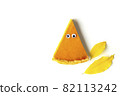 Slice of pumpkin pie in form of Halloween ghost with eyes on white isolated background. Festive creative food concept 82113242