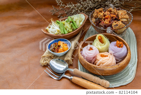 Rice noodles with spicy pork sauce or Nam ngiao Rice Noodle. Rice noodles with spicy pork sauce or Nam ngiao Rice Noodle. 82114104