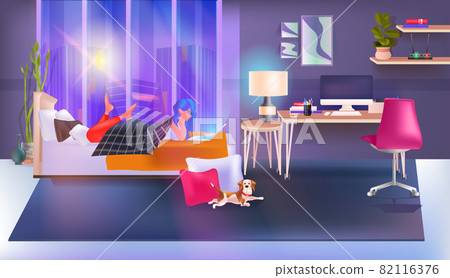 woman using chatting app on laptop social media network online communication concept bedroom interior 82116376