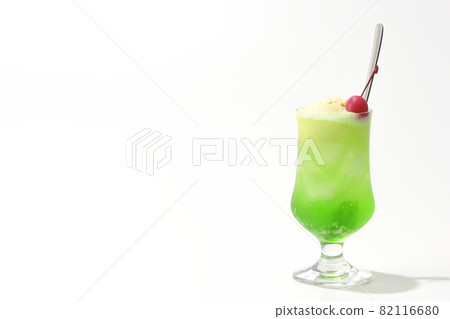 Photographed melon cream soda with cherries on a white background 82116680