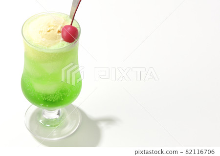 Photographed melon cream soda with cherries on a white background Photographed melon cream soda with cherries on a white background 82116706