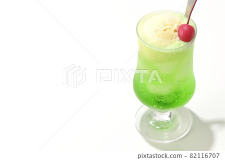 Photographed melon cream soda with cherries on a white background Photographed melon cream soda with cherries on a white background 82116707
