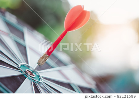 Business marketing success concept. Red dart arrow in center of the target dartboard. Bullseye is a target of business. 82121599