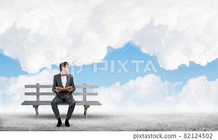 Young student with a book 82124502