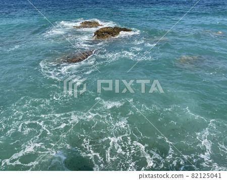 Rocky beach and crystal turquoise water of Ionian Sea in Albania. 82125041