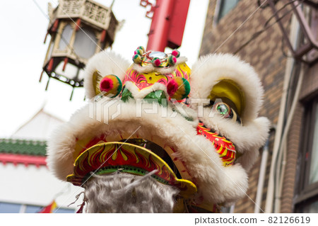 Traditional Dragon dance during Lunar New Year celebration in Chinatown in Kobe, Japan 82126619