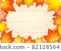 Maple frame on a wood grain background 82128564