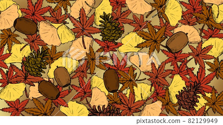 Autumn leaves background of fallen leaves and nuts that fell on the ground 82129949