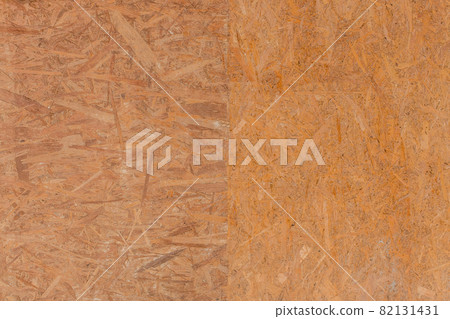 Brown chipboard abstract pattern surface, pressed wood texture, particleboard background Brown chipboard abstract pattern surface, pressed wood texture, particleboard background 82131431