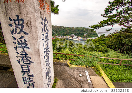 Scenery of Habuminato, a quaint port town seen from the Habuminato Observatory in Oshima-cho, Tokyo, on Izu Oshima Scenery of Habuminato, a quaint port town seen from the Habuminato Observatory in Oshima-cho, Tokyo, on Izu Oshima 82132358