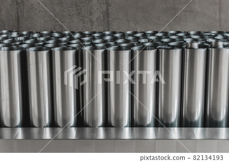 Pile of round metal pipes at a construction site. Storage steel tube industrial materials on warehouse Pile of round metal pipes at a construction site. Storage steel tube industrial materials on warehouse 82134193