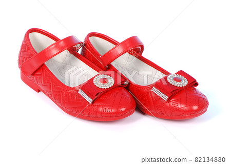 Chilren red shoes on white background. Chilren red shoes on white background. 82134880