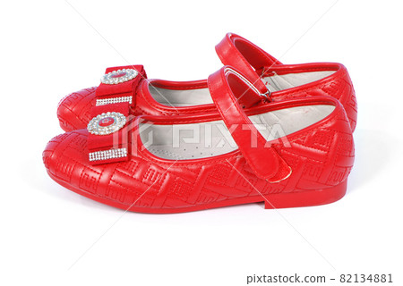Chilren red shoes on white background. Chilren red shoes on white background. 82134881