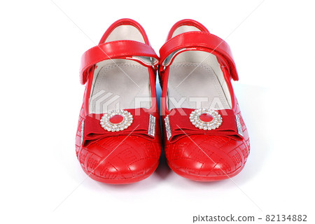 Chilren red shoes on white background. Chilren red shoes on white background. 82134882