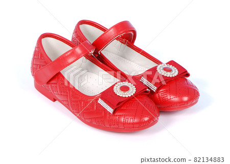 Chilren red shoes on white background. Chilren red shoes on white background. 82134883